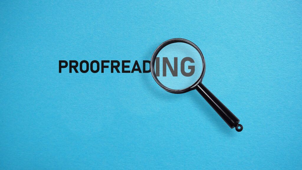 the word proofreading with a magnifying glass